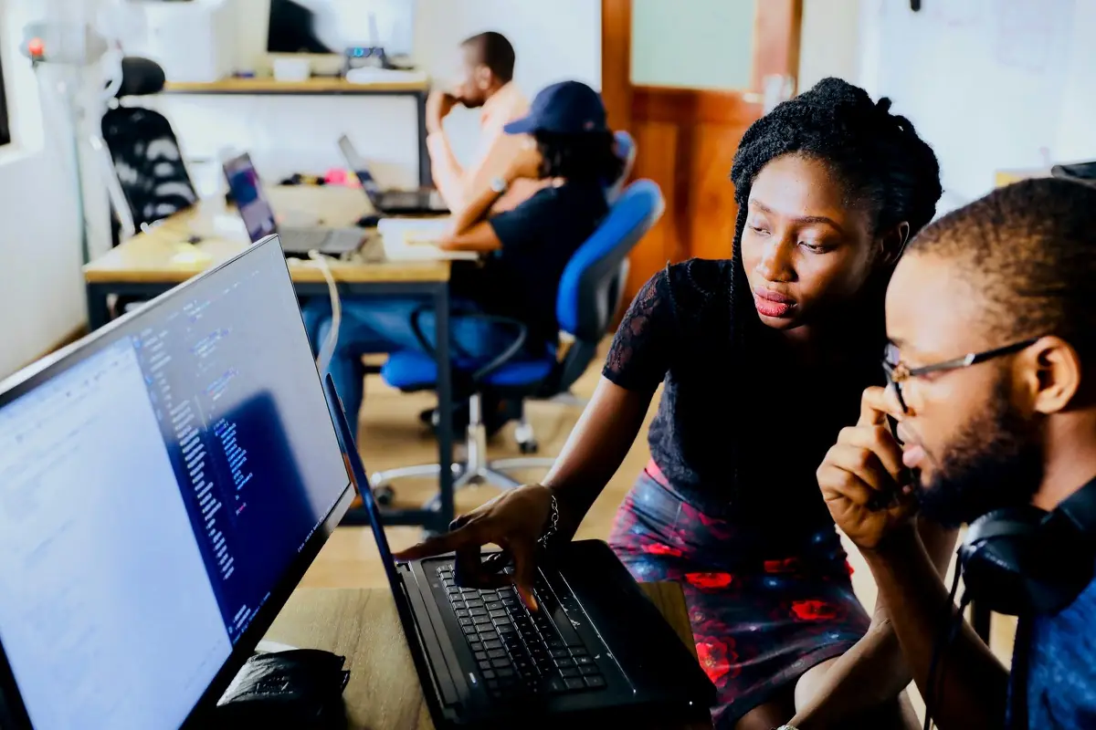 Two engineers working through a deployment together